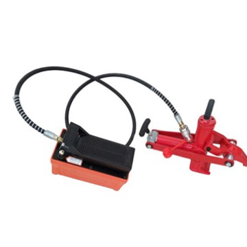 Pneumatic hydraulic tire stripping device